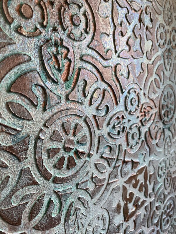 oxidised copper stencil with venetian plaster
