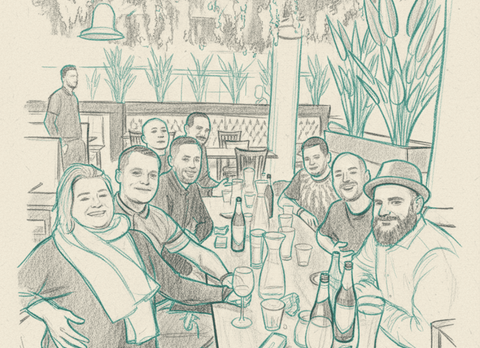 Group of friends enjoying drinks at a social event.